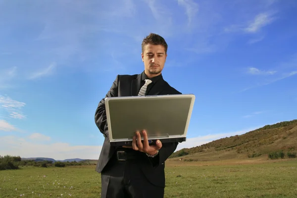 Business man working on laptop Stock Photo