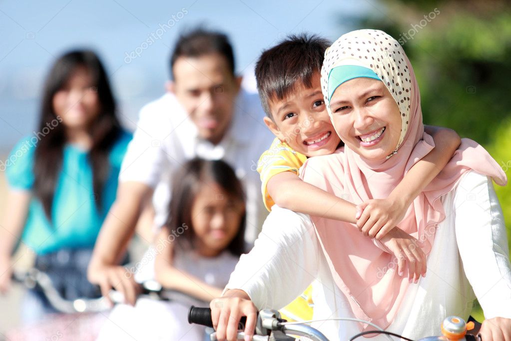 happy family with bikes