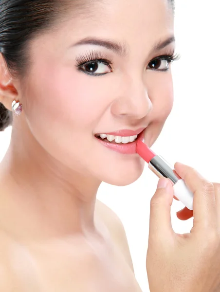 Woman applying lipstick — Stock Photo, Image