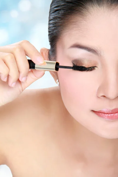 Woman with mascara — Stock Photo, Image