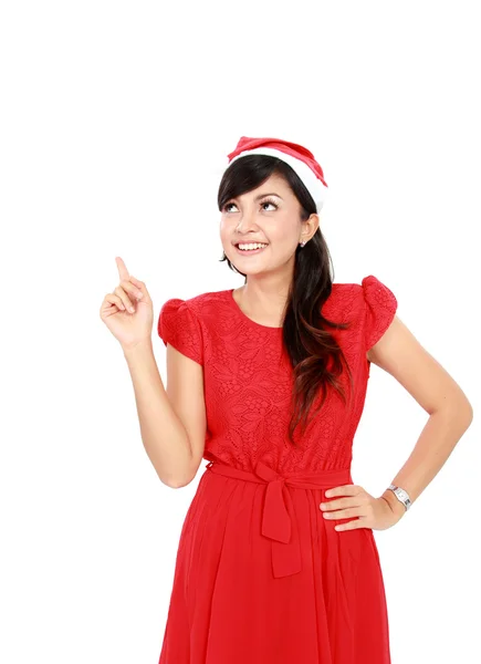 Attractive woman in red pointing up — Stock Photo, Image