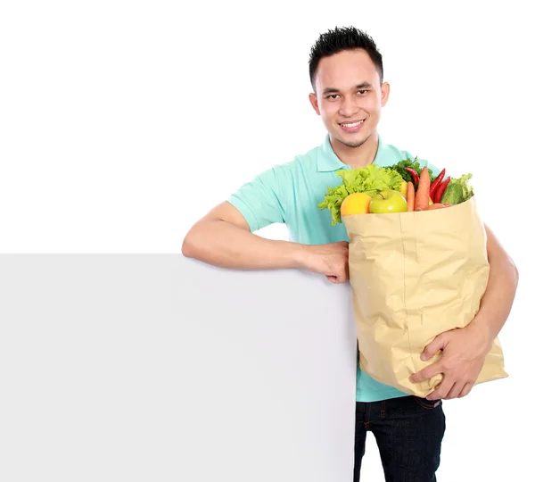 Homem com saco de supermercado — Fotografia de Stock