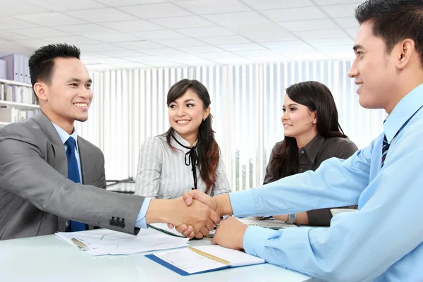 Business team making a deal Stock Picture