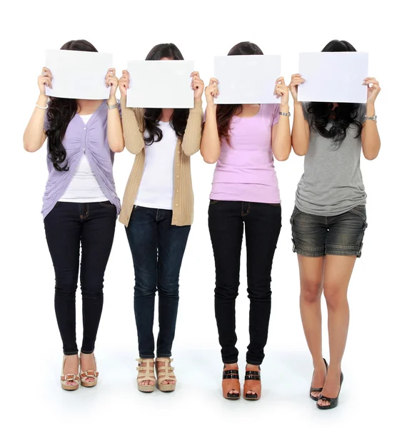 Group of beautiful women with blank paper — Stock Photo, Image