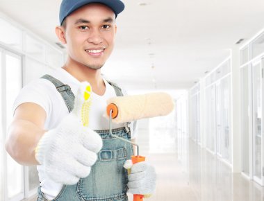 ressam işçi başparmak gösterilen