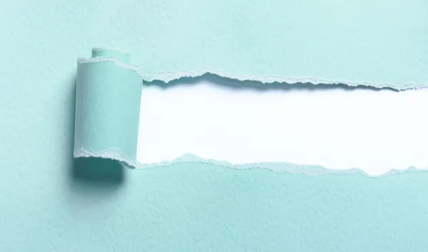 Ripped light blue paper — Stock Photo, Image