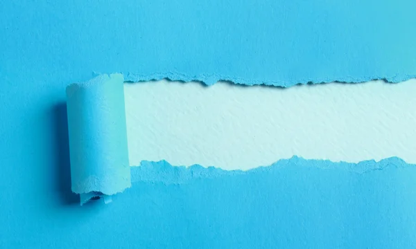 Ripped blue paper — Stock Photo, Image