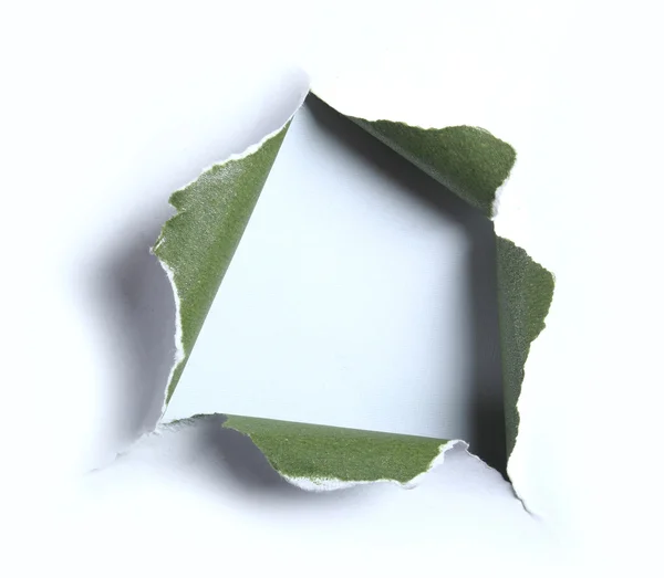 Белый с зеленой порванной бумагой квадратной формы — стоковое фото