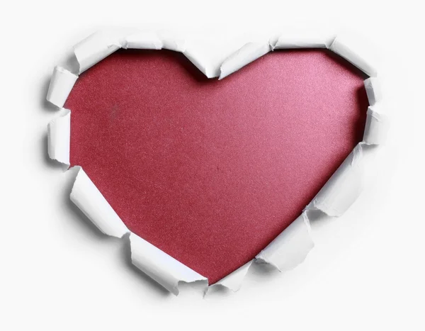 Белая рваная бумага с формой сердца — стоковое фото