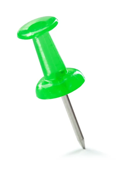 Крупным планом зеленый значок канцелярской кнопки — стоковое фото