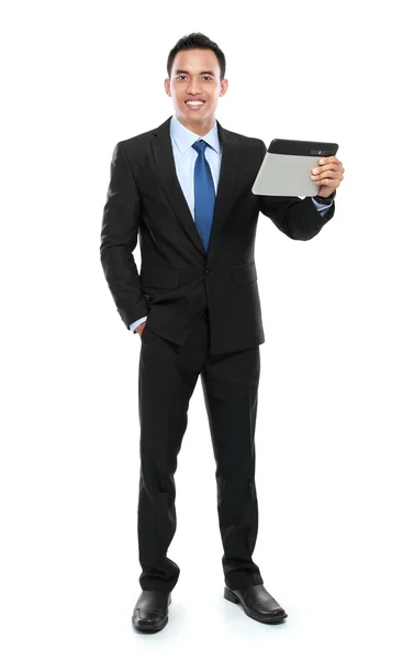 Hombre de negocios sosteniendo una tableta PC — Foto de Stock