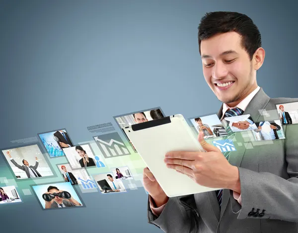 Business man with tablet — Stock Photo, Image