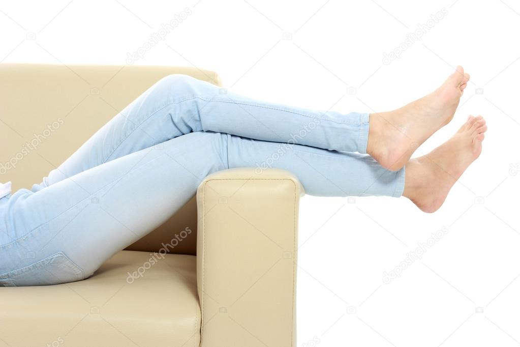 Young woman putting her feet up