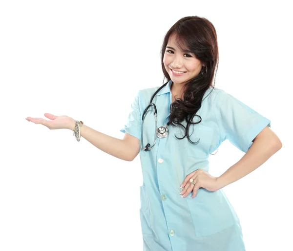 Beauty nurse showing blank space — Stock Photo, Image