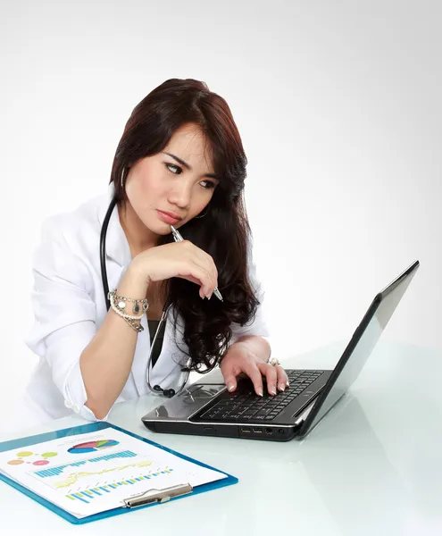 Busy young doctor — Stock Photo, Image