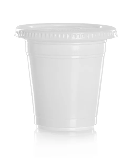 Weißes Kunststoffglas für flüssiges Produkt — Stockfoto