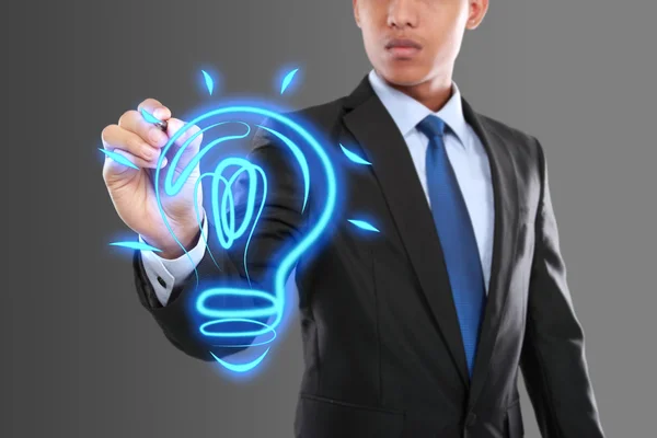 Business man drawing idea light bulb — Stock Photo, Image