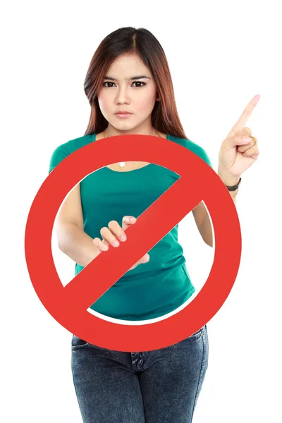 Young woman holding prohibited sign — Stock Photo, Image
