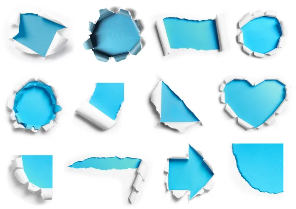 Collection of white torn paper with blue background in many shap — Stock Photo, Image