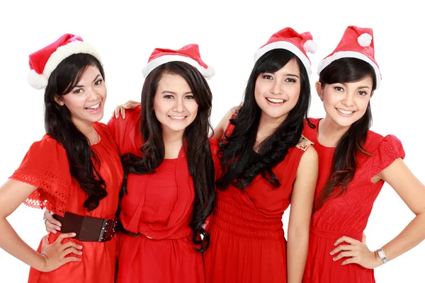 Felice giovane quattro asiatico donna con natale Santa hat — Foto Stock