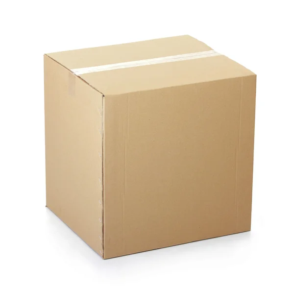 Closed cardboard box taped up — Stock Photo, Image