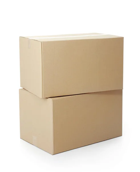 Pilhas de caixas de papelão — Fotografia de Stock