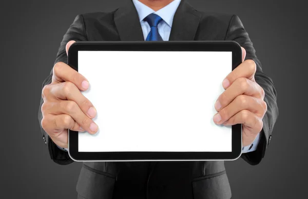 Foto de un hombre de negocios mostrando el monitor de la tableta en blanco — Foto de Stock