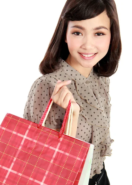 Vásárlás a nő boldog mosolygó gazdaság bevásárló táskák — Stock Fotó