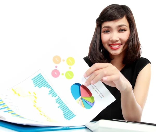 Business woman working on her desk Stock Image