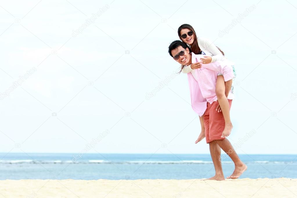 romantic young couple on the beach