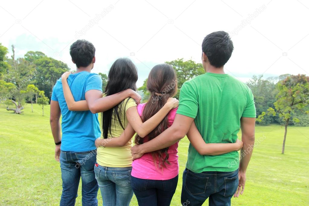 group of people holding each other