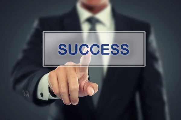 Businessman push to Success button on virtual screen — Stock Photo, Image