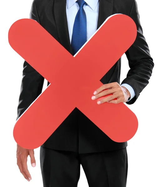 Retrato del hombre de negocios sosteniendo el signo de cruz roja — Foto de Stock