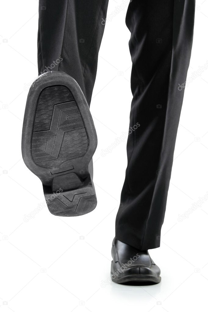 businessman foot stepping