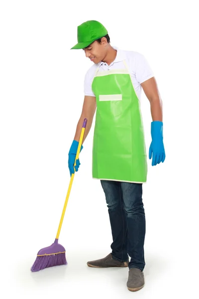 Homem varrer chão — Fotografia de Stock