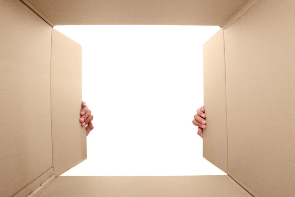 Hand open cardboard box — Stock Photo, Image