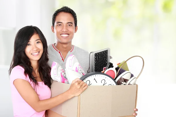 Man and woman with their stuff — Stock Photo, Image