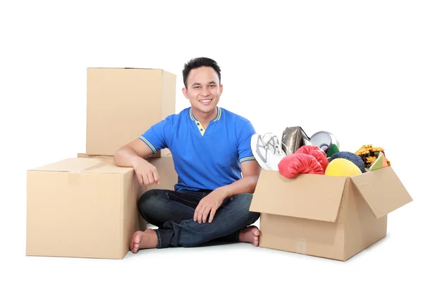 Moving day. man with cardboard box — Stock Photo, Image