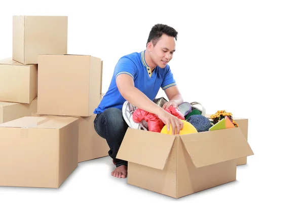 Moving day. man with cardboard box — Stock Photo, Image