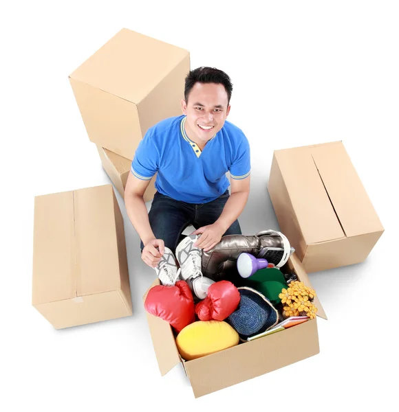 Moving day. man with cardboard box — Stock Photo, Image