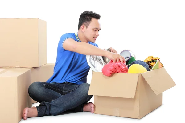 Moving day. man with cardboard box — Stock Photo, Image