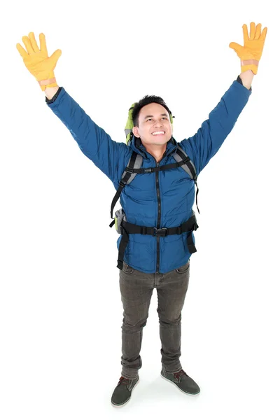 Male hiker with backpack raised his arm — Stock Photo, Image