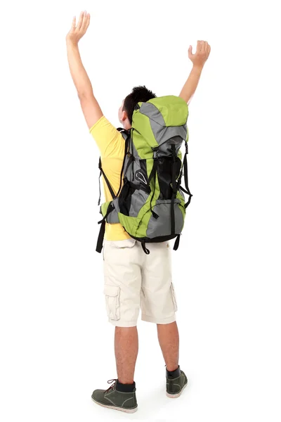 Male hiker with backpack raised his arm — Stock Photo, Image