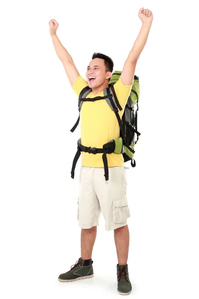 Male hiker with backpack raised his arm — Stock Photo, Image