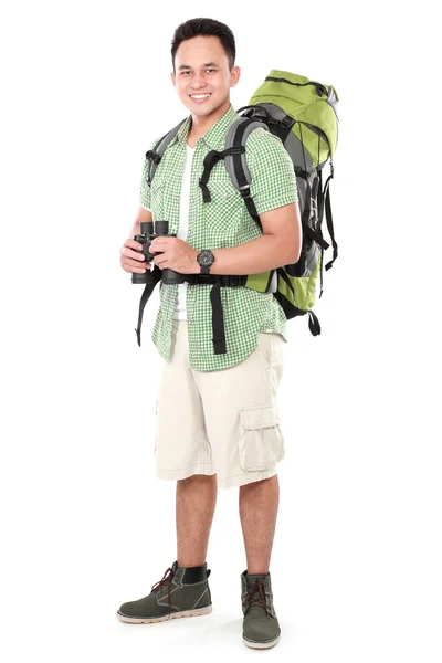 Hiker man tourist with binoculars — Stock Photo, Image