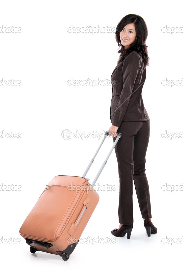 beautiful young business woman with suitcase