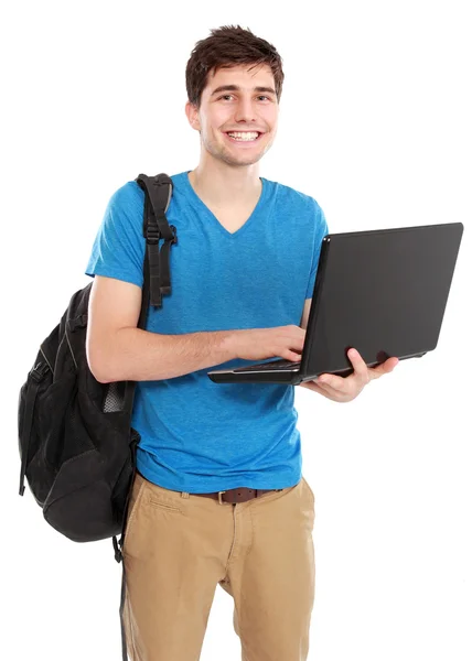 Ung manlig student med laptop — Stockfoto