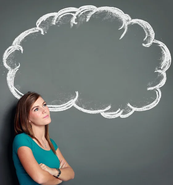 Girl looking up to blank bubble speech — Stock Photo, Image