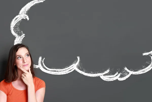 Girl looking up to blank bubble speech — Stock Photo, Image