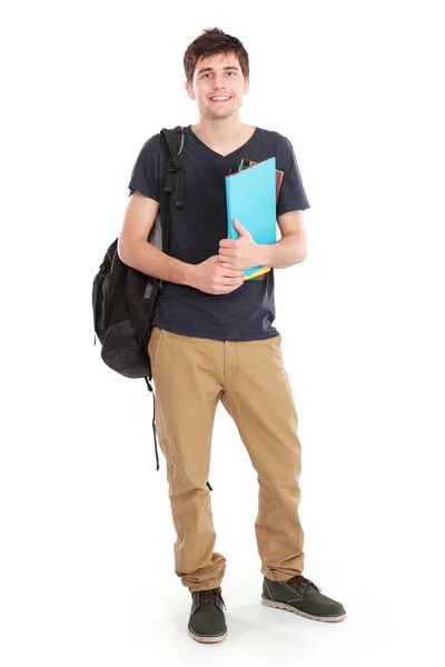 Молодий щасливий студент, що носить книги — стокове фото